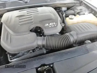 2019 Dodge Challenger SXT z VIN 2C3CDZAG1KH505873, wystawiony jako Copart lot #84414585 z przebiegiem 103 947 mil mil oraz Szkoda całkowita • Salvage title. Historia ofert i sprzedaży dostępna na DreamBid. Obrazek 13.