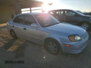 2003 Hyundai Accent GL with VIN KMHCG45C93U496038, listed as a Copart auction lot 87260904 with 104,251 mi miles and Salvage Title. Bid and sale history available at carsss.com. Image 4.