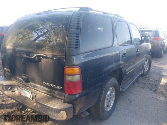 2003 Chevrolet Tahoe LT with VIN 1GNEC13Z63J251155, listed as a IAAI auction lot 42036158 with Not provided miles and . Bid and sale history available at DreamBid. Image 4.