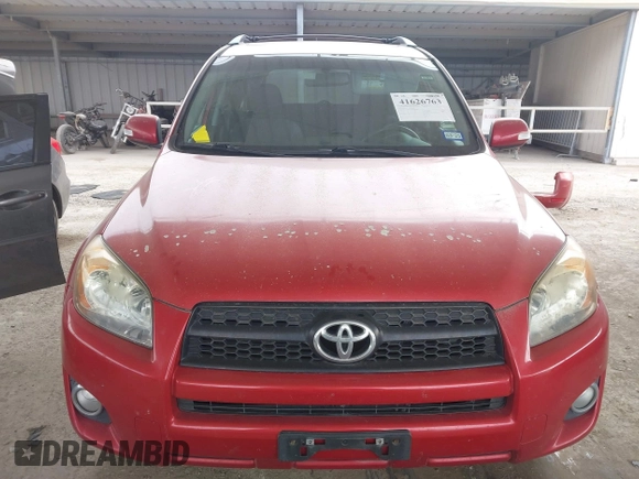 2010 Toyota RAV4 Sport z VIN JTMWF4DV2A5028148, wystawiony jako IAAI lot #41626763 z przebiegiem 155 075 mil mil oraz . Historia ofert i sprzedaży dostępna na DreamBid. Obrazek 13.