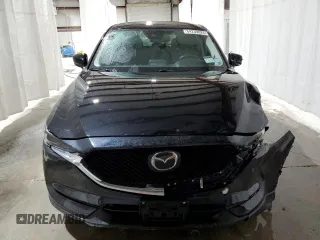 2018 Mazda CX-5 Grand Touring with VIN JM3KFBDM1J0440947, listed as a Copart auction lot 48579825 with 63,164 mi miles and Non Repairable. Bid and sale history available at carsss.com. Image 5.