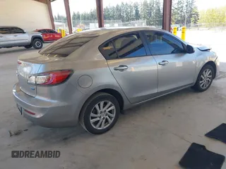 2012 Mazda Mazda3 i Touring with VIN JM1BL1V76C1595589, listed as a IAAI auction lot 42047555 with 139,427 mi miles. Bid and sale history available at carsss.com. Image 4.