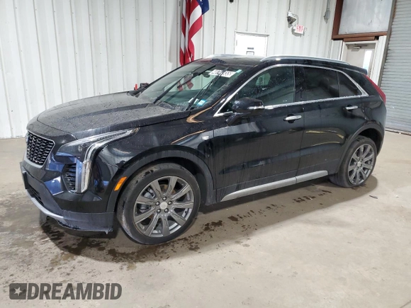 2021 Cadillac XT4 AWD Premium Luxury z VIN 1GYFZDR41MF001099, wystawiony jako Copart lot #48744655 z przebiegiem 57 633 mil mil oraz Czysty tytuł • Clean title. Historia ofert i sprzedaży dostępna na DreamBid. Obrazek 1.
