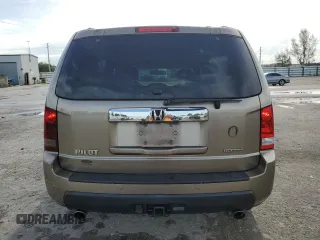 2010 Honda Pilot Touring with VIN 5FNYF3H81AB016255, listed as a Copart auction lot 71052644 with 96,847 mi miles and Salvage Title. Bid and sale history available at DreamBid. Image 6.