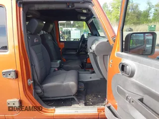 2010 Jeep Wrangler Unlimited Sport with VIN 1J4HA3H1XAL189667, listed as a IAAI auction lot 42062351 with 144,838 mi miles. Bid and sale history available at carsss.com. Image 5.