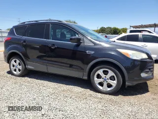 2013 Ford Escape SE with VIN 1FMCU0GX2DUC15734, listed as a Copart auction lot 63088075 with 132,322 mi miles and Clean title. Bid and sale history available at DreamBid. Image 4.