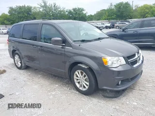 2018 Dodge Grand Caravan SXT z VIN 2C4RDGCG2JR248576, wystawiony jako IAAI lot #42203411 z przebiegiem 100 815 mil mil oraz . Historia ofert i sprzedaży dostępna na DreamBid. Obrazek 1.