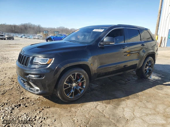 2015 Jeep Grand Cherokee SRT with VIN 1C4RJFDJ1FC663370, listed as a Copart auction lot 86608514 with 123,209 mi miles and Salvage Title. Bid and sale history available at carsss.com. Image 1.