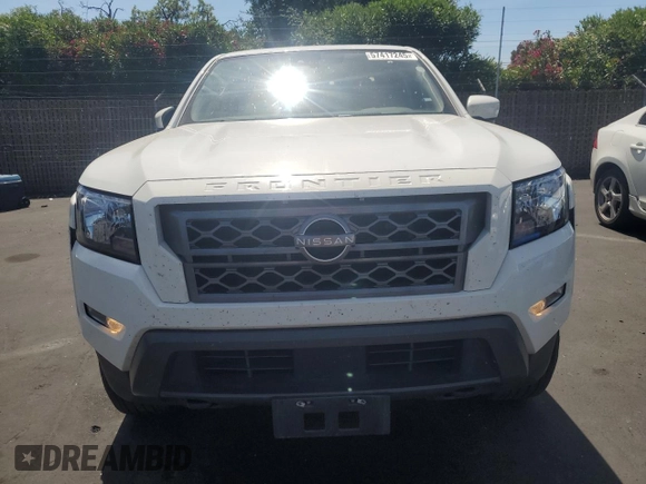 2022 Nissan Frontier Pro-4X with VIN 1N6ED1EKXNN674402, listed as a Copart auction lot 57417245 with 13,986 mi miles and Salvage title. Bid and sale history available at DreamBid. Image 5.