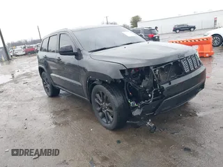 2021 Jeep Grand Cherokee Laredo X with VIN 1C4RJEAG1MC680282, listed as a IAAI auction lot 41466496 with 58,855 mi miles. Bid and sale history available at carsss.com. Image 1.