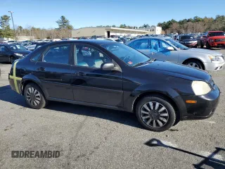 2006 Suzuki Forenza z VIN KL5JD56ZX6K278029, wystawiony jako Copart lot #82026904 z przebiegiem 117 700 mil mil oraz Szkody całkowita. Historia ofert i sprzedaży dostępna na DreamBid. Obrazek 4.
