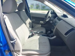 2010 Ford Focus SE with VIN 1FAHP3FNXAW159048, listed as a IAAI auction lot 42103062 with 142,810 mi miles. Bid and sale history available at carsss.com. Image 5.