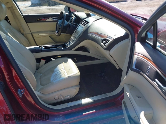 2015 Lincoln MKZ Hybrid with VIN 3LN6L2LUXFR606101, listed as a IAAI auction lot 41668806 with 77,112 mi miles. Bid and sale history available at carsss.com. Image 5.