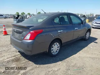 2015 Nissan Versa SV with VIN 3N1CN7AP0FL908711, listed as a IAAI auction lot 42200288 with 157,615 mi miles. Bid and sale history available at carsss.com. Image 4.