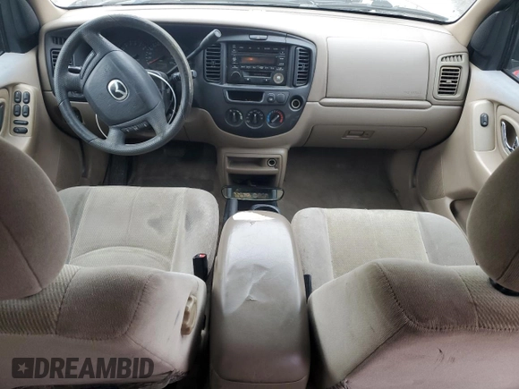 2002 Mazda Tribute LX with VIN 4F2YU09132KM24637, listed as a Copart auction lot 88919855 with 211,198 mi miles and Salvage Title. Bid and sale history available at carsss.com. Image 8.