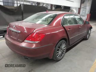 2006 Acura RL z VIN JH4KB16566C008802, wystawiony jako IAAI lot #41457360 z przebiegiem 212 443 mil mil oraz . Historia ofert i sprzedaży dostępna na DreamBid. Obrazek 4.