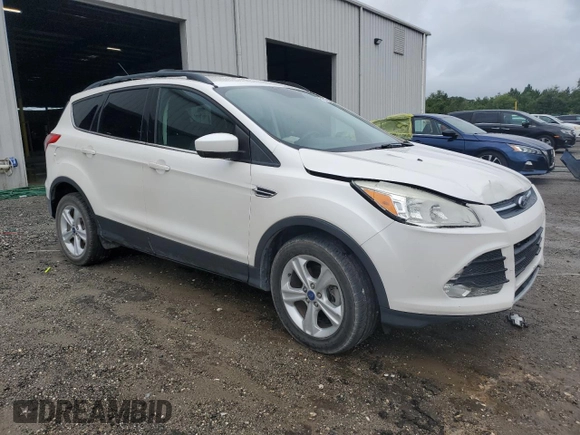 2013 Ford Escape SE with VIN 1FMCU0GX3DUB86597, listed as a Copart auction lot 59513935 with 94,293 mi miles and Salvage title. Bid and sale history available at DreamBid. Image 4.