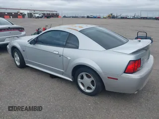 2000 Ford Mustang GT with VIN 1FAFP42X9YF173747, listed as a IAAI auction lot 41977220 with 169,097 mi miles. Bid and sale history available at carsss.com. Image 3.