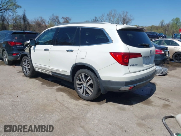 2016 Honda Pilot Touring with VIN 5FNYF6H9XGB005516, listed as a IAAI auction lot 41975049 with 85,217 mi miles. Bid and sale history available at carsss.com. Image 3.
