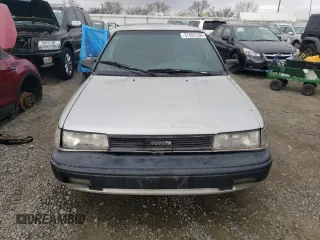 1992 Toyota Corolla z VIN 1NXAE91A1NZ346555, wystawiony jako Copart lot #37697334 z przebiegiem 232 988 mil mil oraz Szkoda całkowita • Salvage title. Historia ofert i sprzedaży dostępna na DreamBid. Obrazek 5.