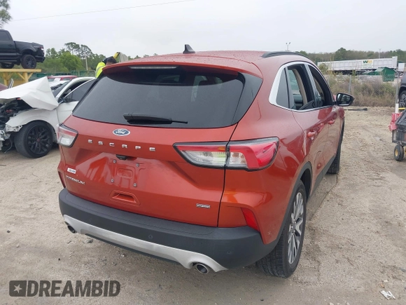 2020 Ford Escape Titanium Hybrid with VIN 1FMCU0DZ1LUB13684, listed as a IAAI auction lot 41629782 with 31,669 mi miles and . Bid and sale history available at DreamBid. Image 4.