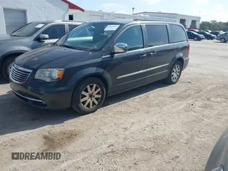 2011 Chrysler Town & Country Touring-L with VIN 2A4RR8DG4BR784138, listed as a IAAI auction lot 42124052 with 105,645 mi miles. Bid and sale history available at carsss.com. Image 2.