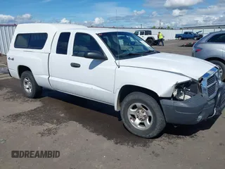 2005 Dodge Dakota ST with VIN 1D7HW22K15S119947, listed as a IAAI auction lot 42372148 with 140,528 mi miles and . Bid and sale history available at DreamBid. Image 1.