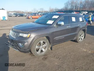 2015 Jeep Grand Cherokee Overland with VIN 1C4RJFCT3FC725239, listed as a IAAI auction lot 41779555 with 100,837 mi miles. Bid and sale history available at carsss.com. Image 2.