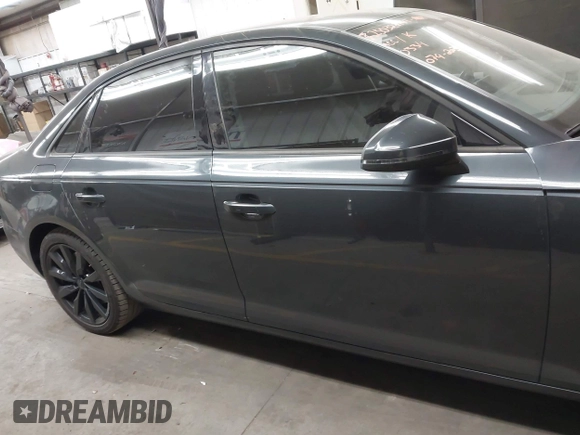 2017 Audi A4 Premium with VIN WAUGNAF43HA040334, listed as a IAAI auction lot 41947631 with 102,544 mi miles. Bid and sale history available at carsss.com. Image 13.