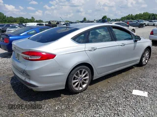 2017 Ford Fusion SE with VIN 3FA6P0H77HR164757, listed as a IAAI auction lot 42604366 with 182,532 mi miles and . Bid and sale history available at DreamBid. Image 4.