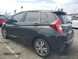 2015 Honda Fit EX-L z VIN 3HGGK5H81FM765225, wystawiony jako Copart lot #56765815 z przebiegiem 126 730 mil mil oraz Szkoda całkowita • Salvage title. Historia ofert i sprzedaży dostępna na DreamBid. Obrazek 2.