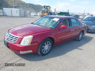 2008 Cadillac DTS 1SC with VIN 1G6KD57Y68U142382, listed as a IAAI auction lot 42093859 with 73,960 mi miles and . Bid and sale history available at carsss.com. Image 2.