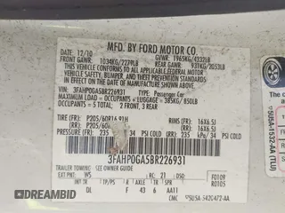 2011 Ford Fusion S with VIN 3FAHP0GA5BR226931, listed as a IAAI auction lot 42035608 with 227,315 mi miles. Bid and sale history available at carsss.com. Image 9.