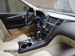 2015 Infiniti Q50 Premium z VIN JN1BV7AP6FM337369, wystawiony jako IAAI lot #41788419 z przebiegiem 106 977 mil mil oraz . Historia ofert i sprzedaży dostępna na DreamBid. Obrazek 5.