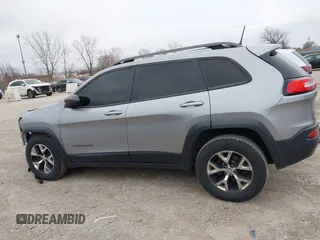 2016 Jeep Cherokee Trailhawk with VIN 1C4PJMBS7GW192574, listed as a IAAI auction lot 41986638 with 144,970 mi miles and . Bid and sale history available at DreamBid. Image 14.
