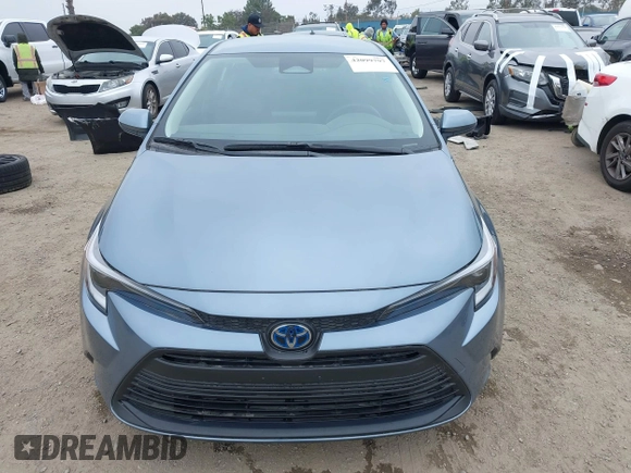 2023 Toyota Corolla Hybrid LE with VIN JTDBCMFE8PJ013271, listed as a IAAI auction lot 42099797 with 14,080 mi miles and . Bid and sale history available at carsss.com. Image 13.