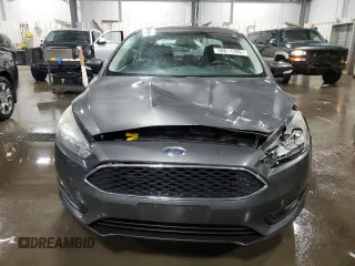 2016 Ford Focus SE z VIN 1FADP3F27GL216059, wystawiony jako Copart lot #59611395 z przebiegiem 170 468 mil mil oraz Szkoda całkowita • Salvage title. Historia ofert i sprzedaży dostępna na DreamBid. Obrazek 5.