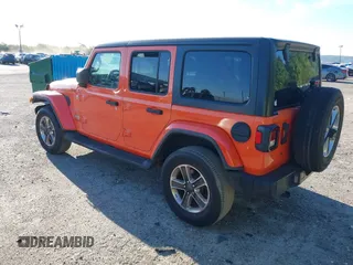 2018 Jeep Wrangler Unlimited Sahara with VIN 1C4HJXEG3JW323634, listed as a IAAI auction lot 41853471 with 126,531 mi miles. Bid and sale history available at carsss.com. Image 3.