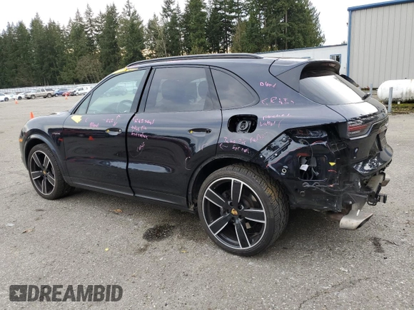 2021 Porsche Cayenne E-Hybrid with VIN WP1AE2AYXMDA25040, listed as a Copart auction lot 47036355 with 63,165 mi miles and Salvage title. Bid and sale history available at DreamBid. Image 2.