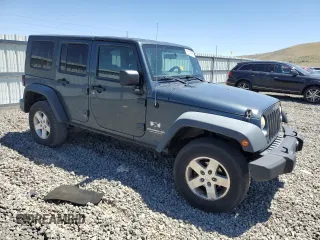 2008 Jeep Wrangler Unlimited X with VIN 1J4GA39168L509720, listed as a Copart auction lot 61014895 with 238,932 mi miles and Salvage title. Bid and sale history available at DreamBid. Image 4.
