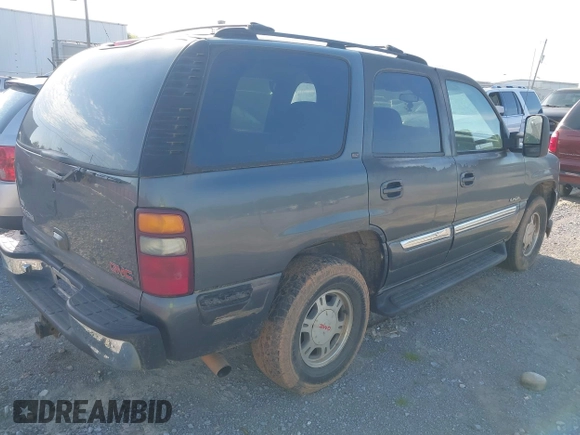 2001 GMC Yukon SLT with VIN 1GKEK13T81J177892, listed as a IAAI auction lot 41924669 with 198,561 mi miles. Bid and sale history available at carsss.com. Image 4.