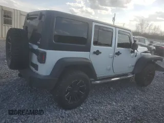 2016 Jeep Wrangler Unlimited Rubicon with VIN 1C4HJWFG4GL121906, listed as a Copart auction lot 48995385 with 96,632 mi miles and Salvage Title. Bid and sale history available at carsss.com. Image 3.