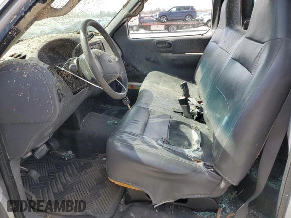 2001 Ford F-150 XL z VIN 2FTZF17261CA31704, wystawiony jako Copart lot #49744315 z przebiegiem 165 613 mil mil oraz Szkoda całkowita • Salvage title. Historia ofert i sprzedaży dostępna na DreamBid. Obrazek 7.