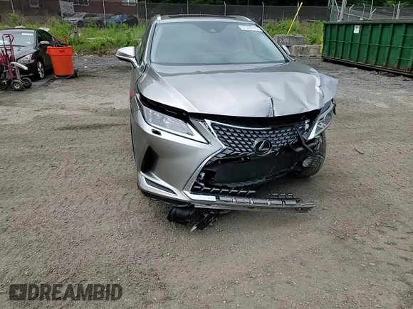 2020 Lexus RX 350 z VIN 2T2HZMDA7LC214475, wystawiony jako Copart lot #57374175 z przebiegiem 41 785 mil mil oraz Szkoda całkowita • Salvage title. Historia ofert i sprzedaży dostępna na DreamBid. Obrazek 14.