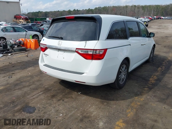 2011 Honda Odyssey EX-L with VIN 5FNRL5H67BB070541, listed as a IAAI auction lot 41812554 with 150,898 mi miles and . Bid and sale history available at DreamBid. Image 4.
