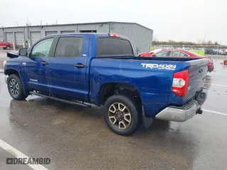 2014 Toyota Tundra 4WD Truck SR5 with VIN 5TFDY5F19EX412813, listed as a IAAI auction lot 41652585 with 164,091 mi miles. Bid and sale history available at carsss.com. Image 3.