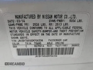 2014 Infiniti Q50 Premium with VIN JN1BV7AR4EM704334, listed as a IAAI auction lot 40922696 with 110,324 mi miles. Bid and sale history available at carsss.com. Image 9.