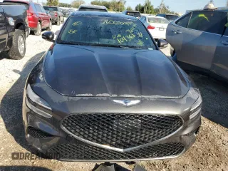 2023 Genesis G70 2.0T with VIN KMTG34TA4PU104352, listed as a Copart auction lot 76000484 with 27,548 mi miles and Salvage Title. Bid and sale history available at DreamBid. Image 5.