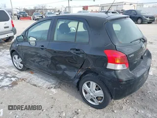 2010 Toyota Yaris with VIN JTDKT4K35A5280923, listed as a IAAI auction lot 41270556 with 175,643 mi miles. Bid and sale history available at carsss.com. Image 3.