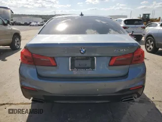 2020 BMW 5 Series with VIN WBAJB1C04LCD11871, listed as a Copart auction lot 66960324 with 4,850 mi miles and Salvage title. Bid and sale history available at DreamBid. Image 6.